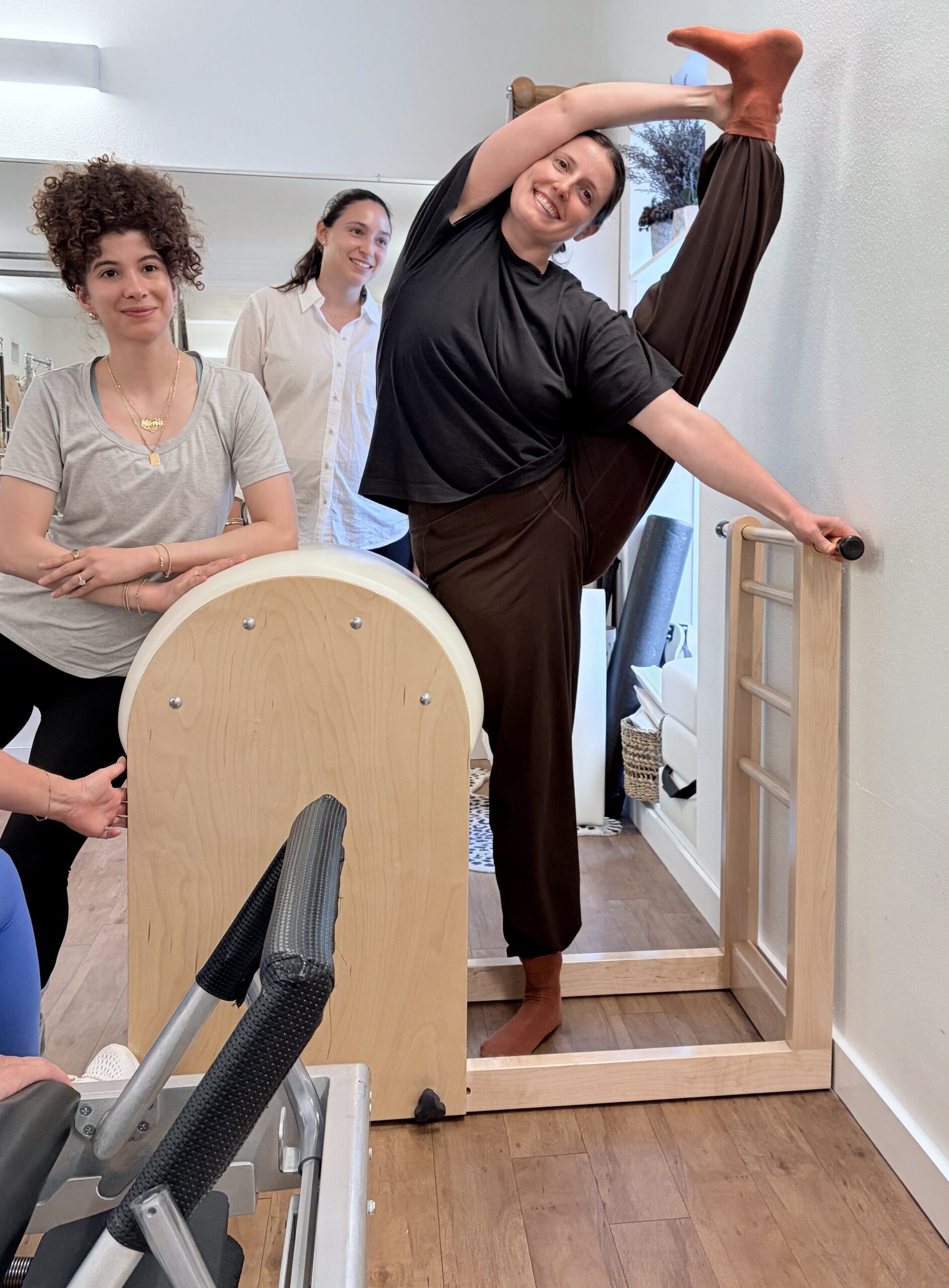Classical Pilates class on multiple apparatus at Sharp Pilates™ studio in Austin Texas